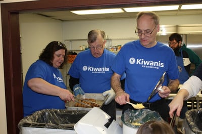 Kiwanis members serving breakfast